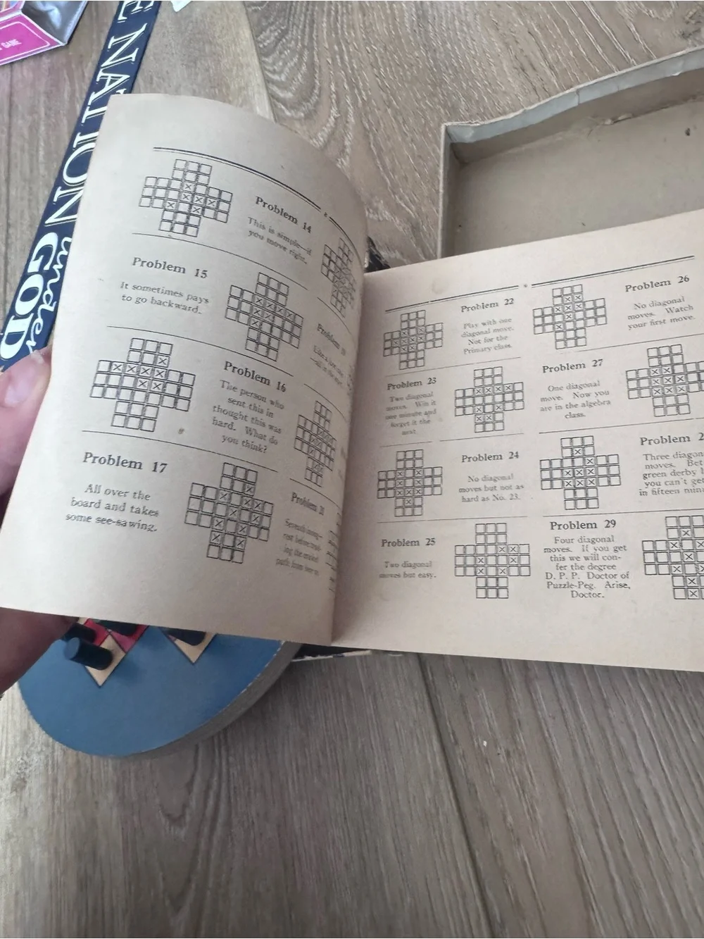 Vintage 1920s Lubbers & Bell Problems puzzle peg game.